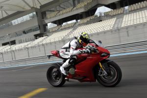 2012 ducati 1199 panigale review video motorcycle com, The compelling Superquadro engine may have enough power to rival the stupendous BMW S1000RR Note the LED turnsignals built into the mirrors