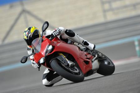 2012 ducati 1199 panigale review video motorcycle com, Reaching for criticisms about the Panigale its faired in sidestand is hard to snag with the heel of a race boot