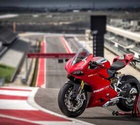 2013 ducati 1199 panigale r review video motorcycle com, The sexy beast Panigale R sits at the top of Turn 1 at Austin s Circuit of the Americas