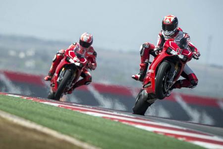 2013 ducati 1199 panigale r review video motorcycle com, Ducati s MotoGP riders Nicky Hayden 69 and crazy legs Ben Spies 11 spun laps on the Panigale R at CotA Hayden said he really enjoyed riding the Panigale and was impressed by how light it steered for a streetbike