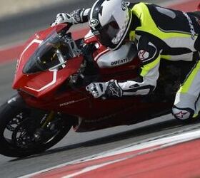 2013 ducati 1199 panigale r review video motorcycle com, The Panigale R feels entirely at home on a racetrack although it may feel a bit cramped for the vertically affluent