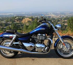 2011 world cruiser shootout video motorcycle com, American designer Tim Prentice penned the English made Triumph Thunderbird With the exception of its parallel Twin engine the T Bird looks like it was born in the U S A