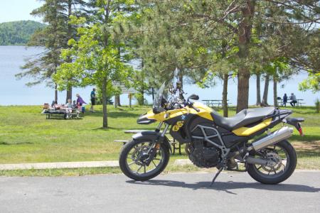 weekend bucket list explorer s edge temiskaming loop and algoma country, A BMW GS taking a break on Highway 60 in Algonquin Park