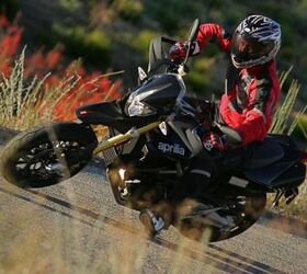 2011 aprilia dorsoduro 1200 review video motorcycle com, Despite its considerable weight and relatively lazy geometry the Dorso is rather agile and enjoys being manhandled