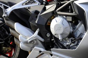 2012 mv agusta f3 675 review motorcycle com, A steel trellis frame joins aluminum sideplates to cradle the 675cc Triple
