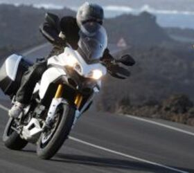 2010 ducati multistrada review motorcycle com, The Touring version of the Multistrada S Note the nostrils that provide air for the oil cooler and airbox intake Windshield is shown in its upper position