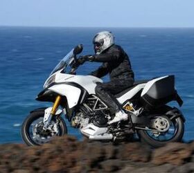 2010 ducati multistrada review motorcycle com, The S version of the Multistrada can be identified by its gold colored fork legs that indicate the Ohlins electronic suspension