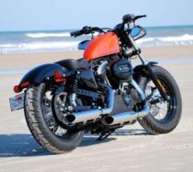 2010 harley davidson sportster forty eight review motorcycle com, Like the Sportster Nightster and other members of the Dark Custom family the Forty Eight keeps to minimalist styling One such element is the integrated brake tail indicator light