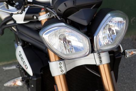 2011 triumph speed triple 1050 review motorcycle com, Goodbye iconic round headlights hello whatever this is All good things must come to an end and the time had come for Triumph to bring the Speed Triple up to date in the headlight department