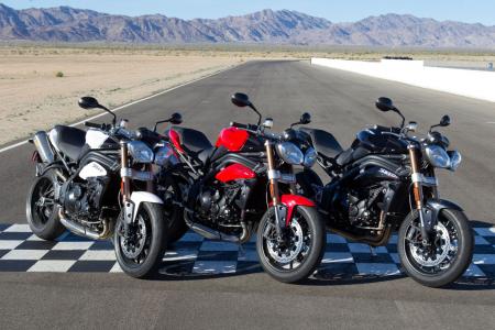 2011 triumph speed triple 1050 review motorcycle com, Pick your poison the Speed Triple will be available in three colors Crystal White Diablo Red or Phantom Black