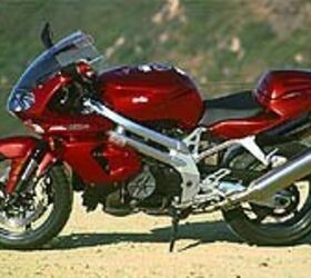 2000 aprilia falco sl1000v motorcycle com, Naked is not really a fair description of the Falco s bodywork unless you consider a thong and baby t shirt naked
