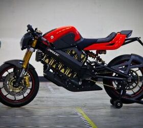 2011 brammo empulse preview motorcycle com, Loaded with batteries un shrouded by plastic bodywork the Empulse prototype stands ready to whet the appetite of Brammo enthusiasts while hoping also to win new coverts who want more than just a short range commuter
