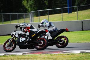 racing electric motorcycles video, The racing was close and action packed the entire race with positions constantly being swapped Photo by Bob Edwards