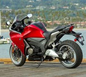 2010 vfr1200f with dct review motorcycle com, The VFR1200F promises a high end exclusive ride Note mechanically actuated rear parking brake caliper below the main caliper