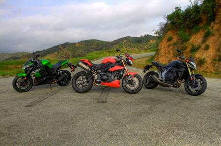 2011 literbike streetfighter shootout motorcycle com, Three bikes worth getting excited about The Kawasaki Z1000 fends off an attack from the resurgent Triumph Speed Triple while an all new CB1000R from Honda is the wild card in our 2011 Literbike Streetfighter Shootout