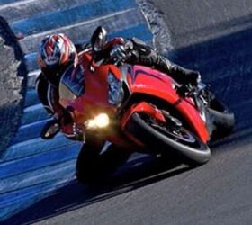 2008 honda cbr1000rr review motorcycle com, With almost 20 fewer pounds and slightly more aggressive steering geometry the new CBR has cooperative agility that is apparent while flip flopping down Laguna s famous corkscrew