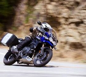 2012 triumph tiger explorer review motorcycle com, The Explorer s height and weight restrict its nimbleness when transitioning between tight canyon bends but once into its lean angle the Explorer corners confidently enough to scratch footpegs through the apex