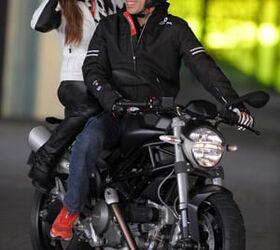 2009 ducati monster 696 review motorcycle com, You ll be smiling too if you re buzzin around on the new Monster 696 cause the ladies like em