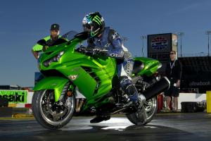 2012 kawasaki zx 14r review video motorcycle com, The ZX 14R s fearsome launch levitates its front wheel under the watchful eye of dragracing legend Rickey Gadson