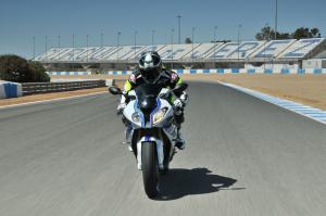 2013 bmw s1000rr hp4 review video motorcycle com, Motojourno perk Riding the world s fastest literbike during a private session on a GP track