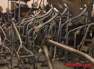 big bear choppers and the state of the production custom industry motorcycle com, Various styles of frames waiting for their turn to go down the production line