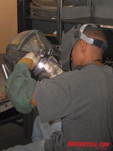 big bear choppers and the state of the production custom industry motorcycle com, Here a Big Bear Chopper employee welds up a fuel tank prior to being pressure tested BBC is so confident in their quality the tanks carry a lifetime original owner warranty