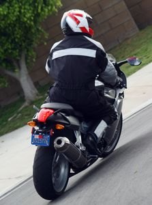 2005 bmw k 1200 s second time around motorcycle com, Sean tests the S turning radius and is surprised to note that it isn t half bad considering its 61 8 wheelbase