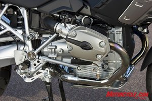 motorcycle com, It doesn t look much different BMW says that a bunch of changes to the trusty 1 170cc Boxer Twin equate to a 5 percent bump in power now with a claimed 105 hp A stronger gearbox and slightly lower gearing puts the newfound ponies to the ground