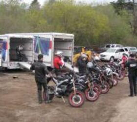 2011 zero electric motorcycles launch motorcycle com, A row of bikes gets ready to head out U hauls make sparse but effective changing rooms