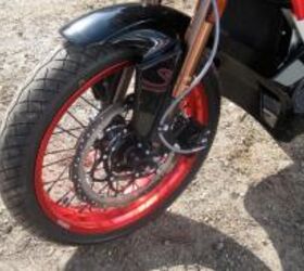 2011 zero electric motorcycles launch motorcycle com, Cross drilled Hayes stoppers work better than the binders on older Zeros The speedo pick up formerly residing on the fork has been relocated to the motor shaft to make it more like other motorcycles Askenazi says plus clean up the look