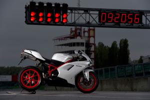 2011 ducati 848 evo review motorcycle com, The Ducati 848 EVO is semi affordable exotica