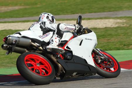 2011 ducati 848 evo review motorcycle com, There s about 120 horses being spat out the rear wheel of the 848 EVO