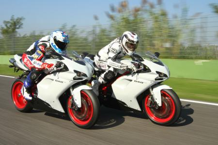 2011 ducati 848 evo review motorcycle com, World Superbike title contender Carlos Checa tries to keep up with Duke