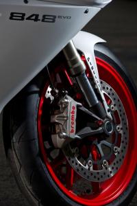 2011 ducati 848 evo review motorcycle com, Brembo s one piece monobloc calipers are a worthwhile upgrade for the racetrack bred 848