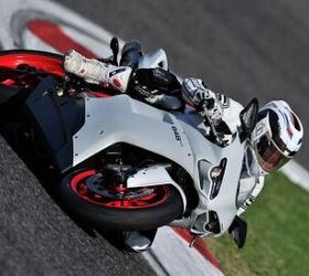 2011 ducati 848 evo review motorcycle com, The 848 EVO loves being leaned over in the corners