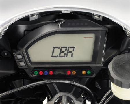 2012 honda cbr1000rr preview motorcycle com, The CBR s instrumentation is upgraded for 2012 now including a lap timer and a five level shift indicator as well as a miles till empty function