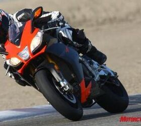 2010 aprilia rsv4 factory review motorcycle com, Hustling this literbike around the track is more akin to flicking a 600cc supersport between turns