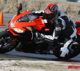 2010 aprilia rsv4 factory review motorcycle com, The RSV4 s handling is biased toward its wonderful feeling front end encouraging its rider to drop his inside shoulder to carve corners with the trustworthy feel from the tire said Duke