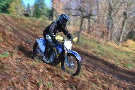 2011 husaberg fx450 review motorcycle com, The suspension on our test bike had been set up for a fast Vet class woods racer but on the grass track our motoheads would have preferred stiffer fork springs and heavier compression damping