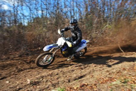 2011 husaberg fx450 review motorcycle com, AMA Pro Dirt Tracker Mike Labelle wondering what everyone is staring at Don t get freaked out by the attention you ll get every time you ride a Husaberg learn to enjoy it