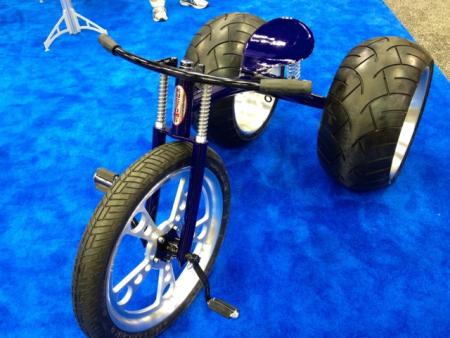 2012 dealer expo, In the Metzeler booth the rubber company teased passersby with this fat tired pedal trike but wasn t allowing test rides