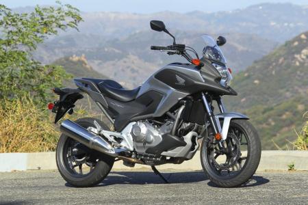 2012 honda nc700x review video motorcycle com, Part adventure bike part urban assault commuter the only thing even remotely close to the Honda NC700X is the Kawasaki Versys