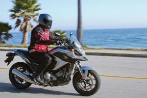 2012 honda nc700x review video motorcycle com, Seating position is neutral and non intimidating ideal for a variety of riding styles with a commanding view of the road