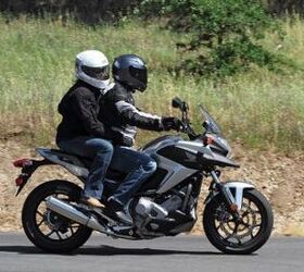 2012 honda nc700x review video motorcycle com, Thanks to the DCT bumping heads with your pillion at each shift is a thing of the past