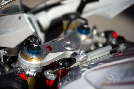 2013 mv agusta f4 and f4 rr review motorcycle com, Ohlins latest EC NIX 43mm fork works in conjunction with the TTX EC rear shock to electronically adjust themselves to suit the riding conditions