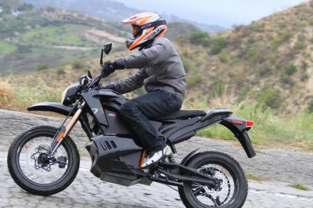 2012 zero ds review video motorcycle com, With its long travel suspension poorly maintained roads like this one are hardly felt as the Zero tracks nicely Note also the open and neutral riding position