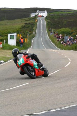fim announces electric racing series, Ron Barber riding an AGNI X101 won the 2009 TTXGP Pro electric race at the Isle of Man
