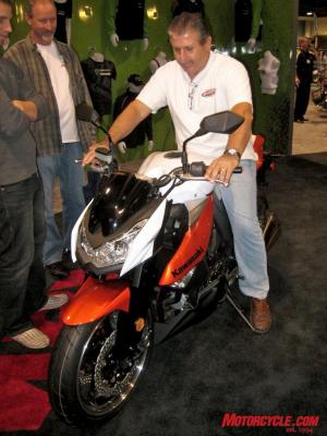 cycle world international motorcycle show at long beach, This dude doesn t look excited as us about the all new Z1000 Get him off there