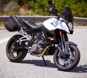 2012 ktm 990 sm t review motorcycle com, A reincarnation of the original 990 SM of years past the SMT differs with the addition of saddlebags and subtle styling changes for 2012