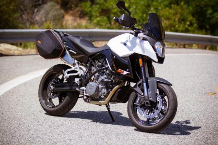 2012 ktm 990 sm t review motorcycle com, A reincarnation of the original 990 SM of years past the SMT differs with the addition of saddlebags and subtle styling changes for 2012